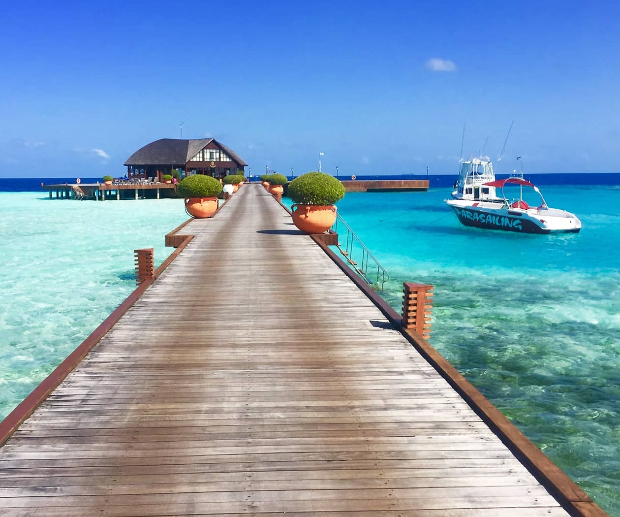 Wooden Pier Leading to Cabin