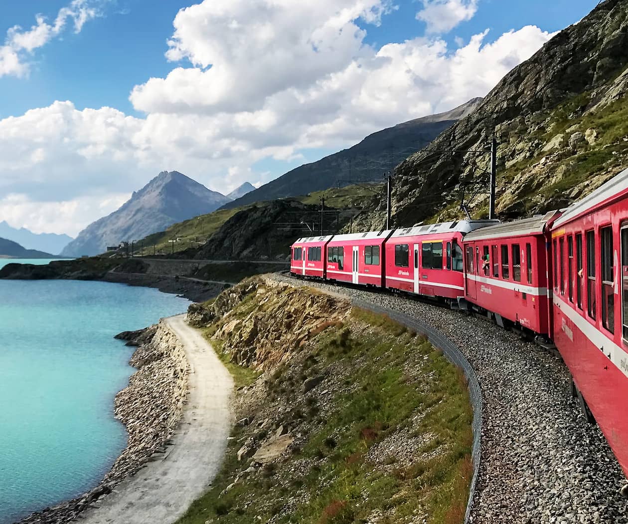 Train Traveling through Swiss Alps